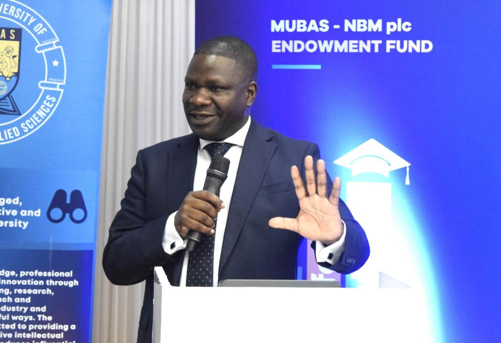 NBM CEO, Harold Jiya, making a presentation at the MUBAS- MoU assigning ceremony NBM injects K150 million into MUBAS Endowment Fund