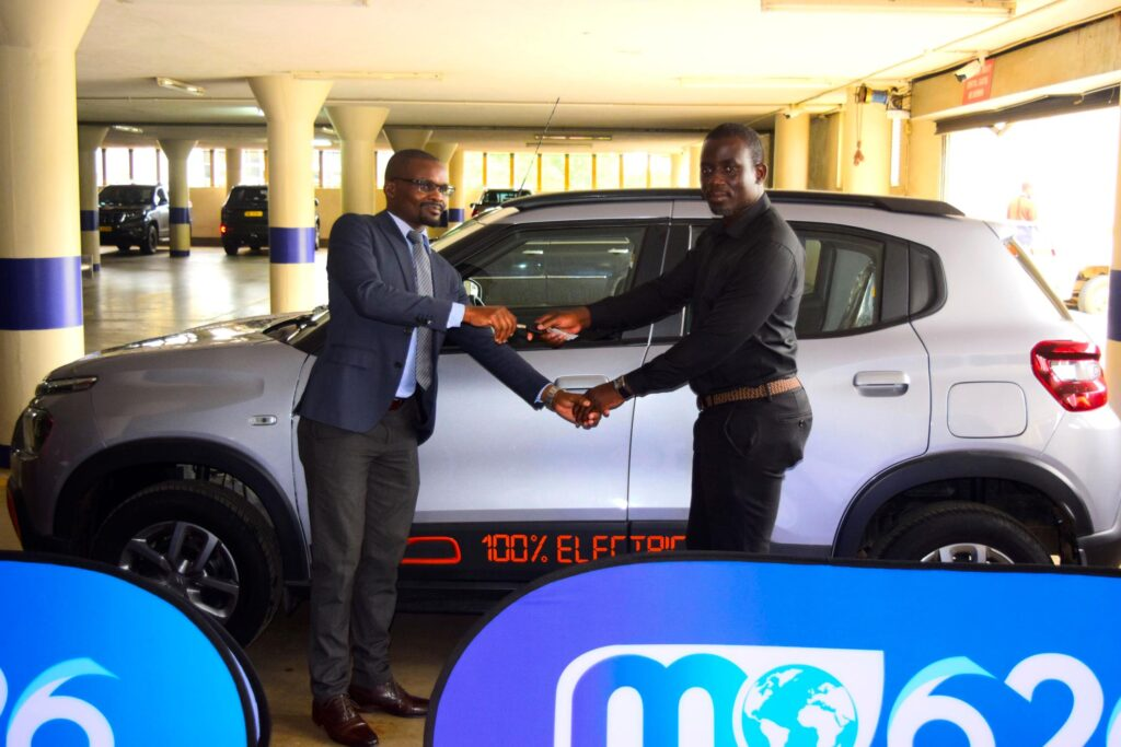 Tchereni(Right) handing over the EV keys to Chikapa Tchereni(Right) handing over the EV keys to Chikapa